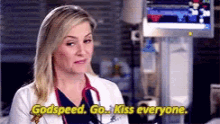 a woman in a lab coat says godspeed go kiss everyone
