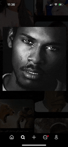 a black and white photo of a man with a tear in his eye
