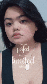 a woman with the words i 'm not perfect but i 'm a limited edition above her
