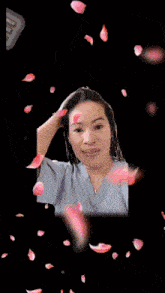 a woman is surrounded by hearts and flowers and a sticker that says ' i love you '