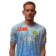 a man is wearing a blue shirt that says vtag