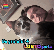 a picture of a man and a cat with the words be grateful 4 lgbtq petz on the bottom