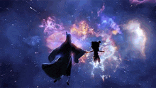 a man and a woman are flying through the air in a galaxy