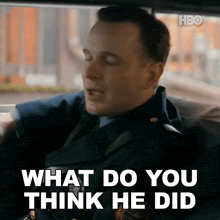 a man in a police uniform is sitting in the back seat of a car and saying what do you think he did .
