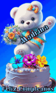 a teddy bear holding a bouquet of flowers on top of a cake