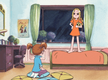 two girls in a bedroom with a poster that says love