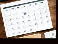 a calendar shows the month of july with a purple square in the middle