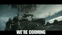 a group of soldiers are fighting a giant robot in a battle scene from a movie .