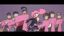 a group of people wearing pink shirts with tnt on their head