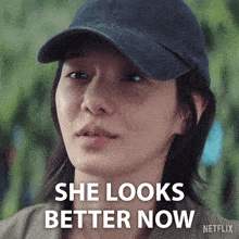 a woman wearing a hat says she looks better now on a netflix ad