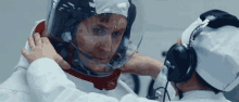 Fixing Fitting Suit GIF - Fixing Fitting Suit Astronaut GIFs