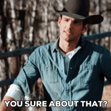a man in a cowboy hat is standing in front of a fence and says `` you sure about that ? ''