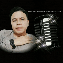 a man is holding a microphone with the words feel the rhythm own the stage behind him