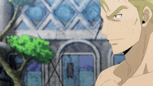 a man without a shirt is standing in front of a building with a tree in the background