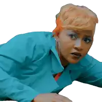 a woman wearing a blue jacket and orange hair looks surprised