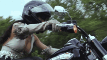 riding a motorcycle kassi ashton black motorcycle motorcyclist rider