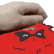 a pixel art of a hand holding a red object