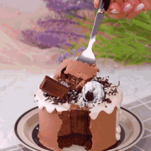a chocolate cake with a piece taken out of it