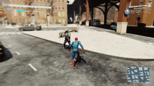 a screenshot of a video game shows a spider man fighting a villain on a city street