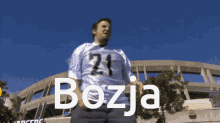a man wearing a jersey that says bozja