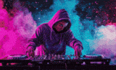 a man in a purple hoodie is playing music on a pioneer dj controller
