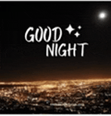 a picture of a city at night with the words `` good night '' written above it .