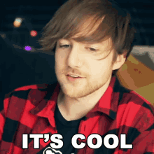 a man wearing a red plaid shirt says it 's cool