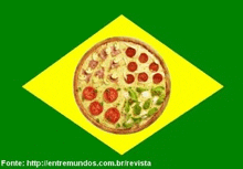 a pizza with four different toppings on a green and yellow flag .