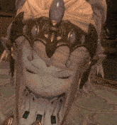 a close up of a girl wearing a crown on her head with her eyes closed