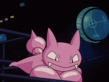 a pink cartoon character is sitting on a ledge with its tongue out