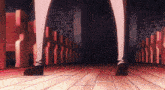 a woman 's legs are shown in a dark room