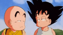 two cartoon characters , goku and krilin , are looking at each other .