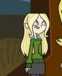 a cartoon character with blonde hair and a green sweater