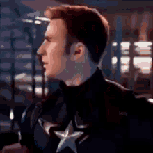 a close up of a man in a captain america uniform
