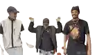 three men are standing next to each other and one of them is wearing a black shirt that says supreme