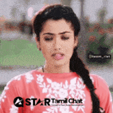a woman in a pink shirt with the words star tamil chat on the bottom
