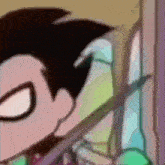 a close up of a cartoon character holding a sword in his hand .