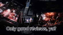a man in a room with the words only good reviews ya