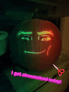a pumpkin with a face carved into it and the words " i got circumcised today "