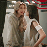 a couple of women standing next to each other with the words lingermoifs on the bottom left