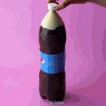 a bottle of pepsi with a blue label