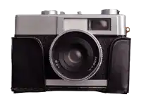 a camera with a black leather case and a lens that says f = 38 mm