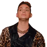 a man wearing a leopard print jacket and a chain around his neck