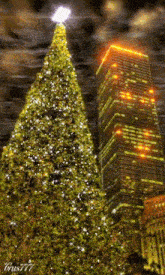 новогодняя елка дом -- небоскреб GIF - новогодняя елка дом -- небоскреб GIFs