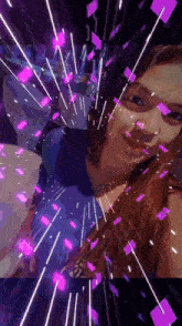 a woman in a blue shirt is surrounded by purple and white squares