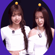 two girls with smiley faces on their heads and the word kamsamimi on the bottom right