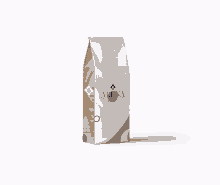 a brown and white bag that says arena coffee on it
