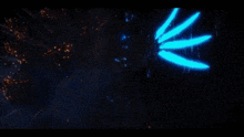 a close up of a fireball with a dark background