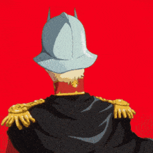 a man wearing a helmet and a black cape