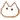 a close up of a cat 's face on a white background